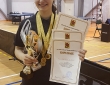 Fotogrāfijā sacensību absolūtā uzvarētāja Jūlija Kirevičeva (Rīgas 3.BJSS)